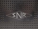 a close up of a metal plate with a logo on it
