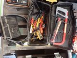 many tools that are in a toolbox on a table