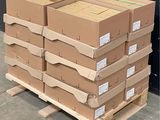 a stack of boxes sitting on a pallet in a warehouse