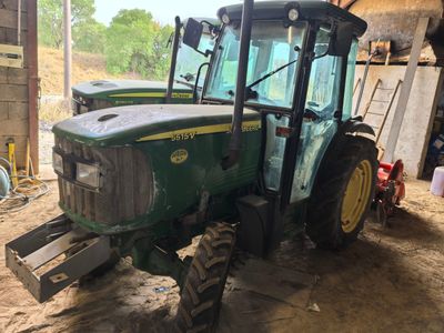 a tractor that is parked inside of a building