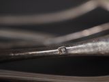 a close up of a pair of scissors on a table