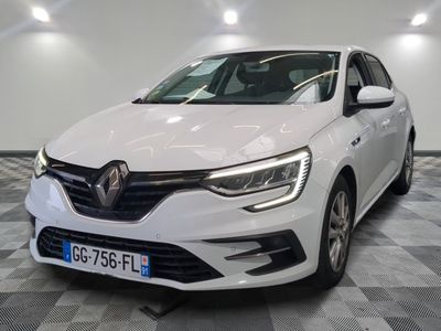 the front view of a white car in a room with a checkered floor