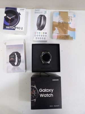a box with a watch sitting on top of it