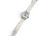 an image of a wrist watch with a white band and a blue face