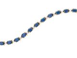 a picture of a blue and white beaded necklace on a white background