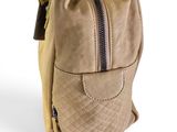 beige leather handbag with zippers and zipper closures on the front