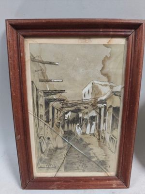 tableau encadré représentant une scène de rue avec des passants marchant dans la rue