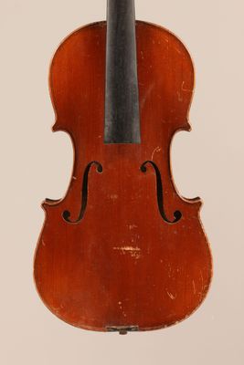 an old violin with a bow on a white background