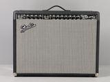 a close up of a guitar amplifier sitting on top of a table