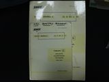 a receipt sitting on a table next to a keyboard