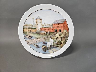 une assiette avec l'image d'un château