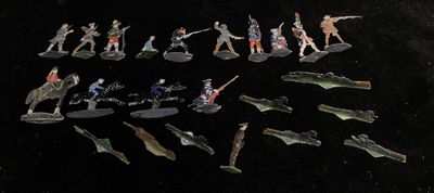 a lot of figurines that are sitting on a table