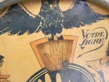 a clock with a picture of a bird on top of it