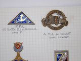some of the badges have been placed on a piece of paper