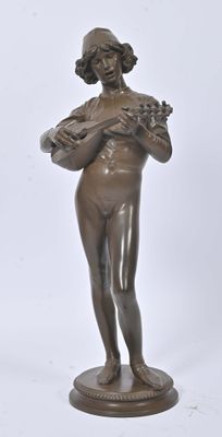 an antique bronze statue of a woman holding a basket of flowers