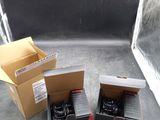 two boxes that are sitting next to each other on the floor