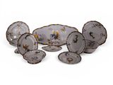a lot of plates that are sitting on a table