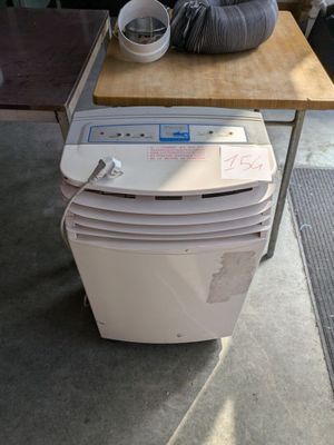 a stack of air conditioners sitting on a table