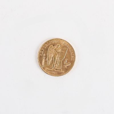 une pièce d'or sur laquelle est représenté un ange