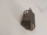 a small metal object that is on a white surface