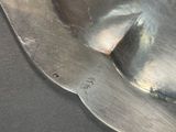 a close up of a metal object on a table