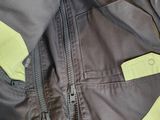 a close up of a jacket with a zipper on it
