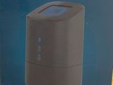 packaging of a home control unit in a box on a table