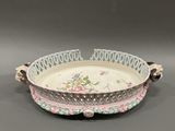 an image of a decorative bowl with a floral design on it