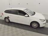 a picture of a white car parked in a garage
