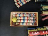 a box of crayon sticks and a box of candy canes