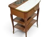 a small wooden table with two bowls on it
