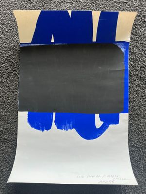 a piece of paper with a blue and white design on it