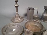 a lot of silver items that are on a table