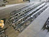 a large amount of steel beams in a warehouse