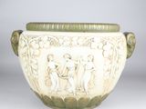 un vase blanc orné d'un motif