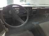 a steering wheel and dashboard of a truck