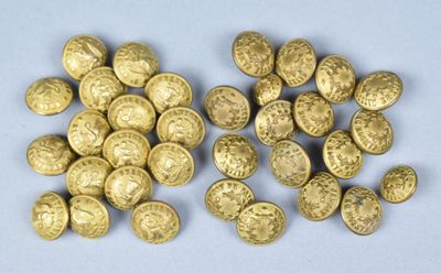 a close up of a pile of gold coins sitting on top of a table