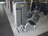 a row of exercise equipment in a gym room
