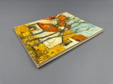une photo d'un livre sur lequel figure une peinture