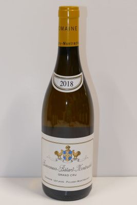 a bottle of wine that is sitting on a table