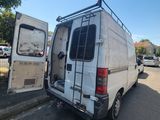 a van that is parked on the side of the road