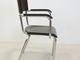 an image of a chair with a black leather seat