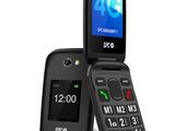 a close up of a cell phone sitting on top of a stand