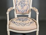 an image of a chair with a blue and white design on it