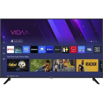 a flat screen tv with a variety of movies on the screen