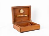 an image of a wooden box with a clock inside of it