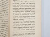 an open book with a black and white image on it
