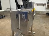 an image of a machine with a spool on top of it