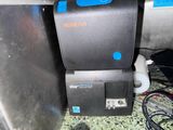 a machine that is sitting on a counter in the kitchen