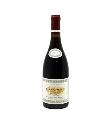 a bottle of wine that is sitting on a table